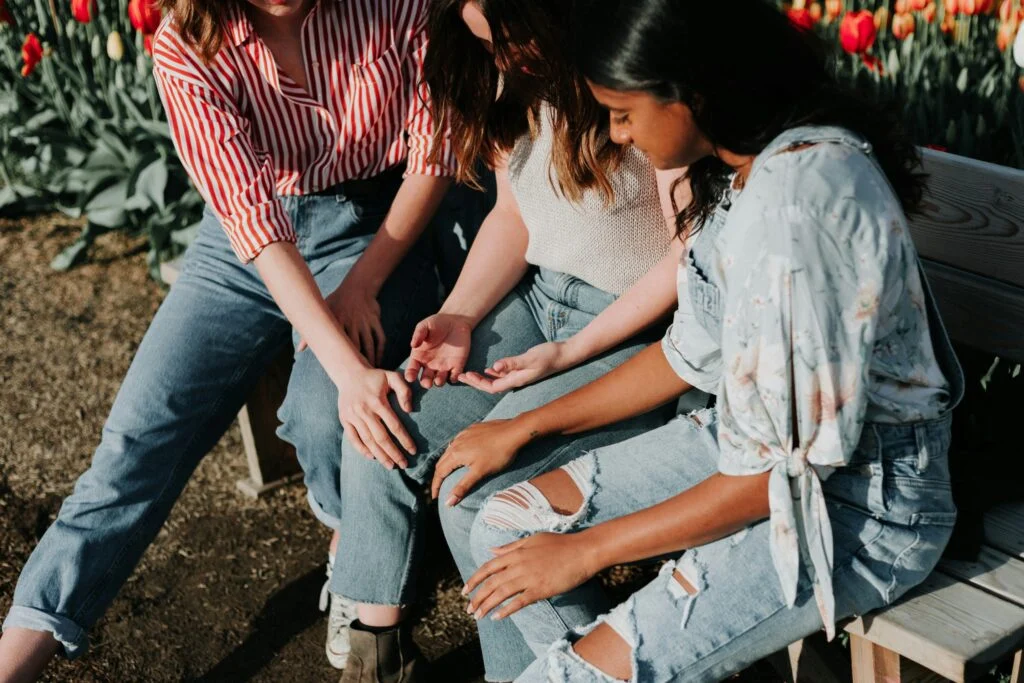 Friends laughing together outdoors