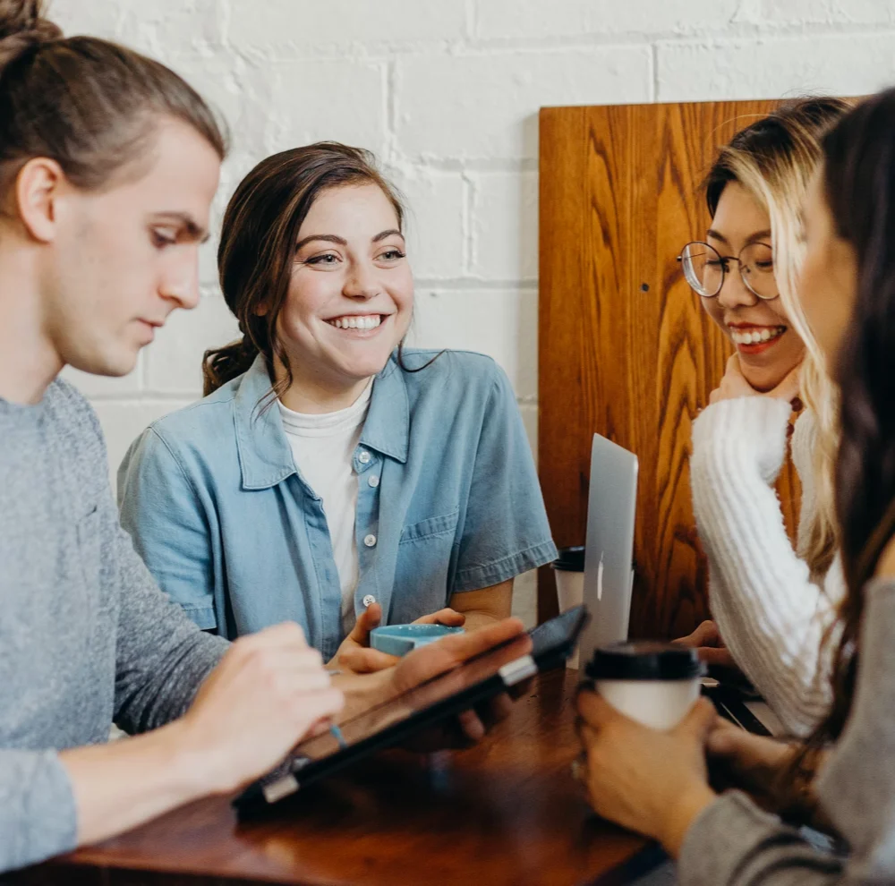 A small group of adults talking together